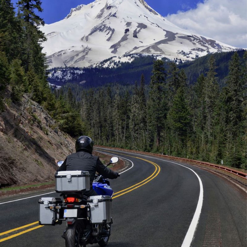 motorcycle riding a mountain road
